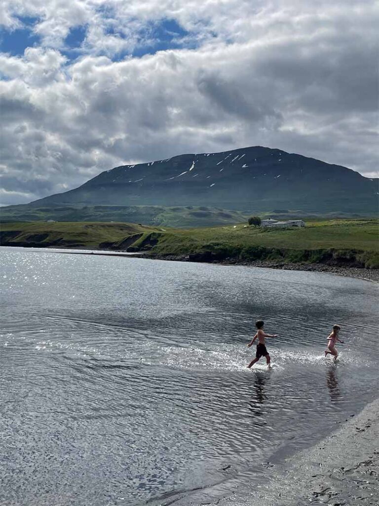 children in an Iceland natural water